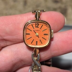 LADIES VINTAGE TIMEX MANUAL WIND WATCH,  Orange Dial STRETCH  BAND, gold tone